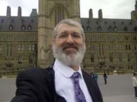 Attorney Gene C. Colman outside the Parliament Bldg, Ottawa